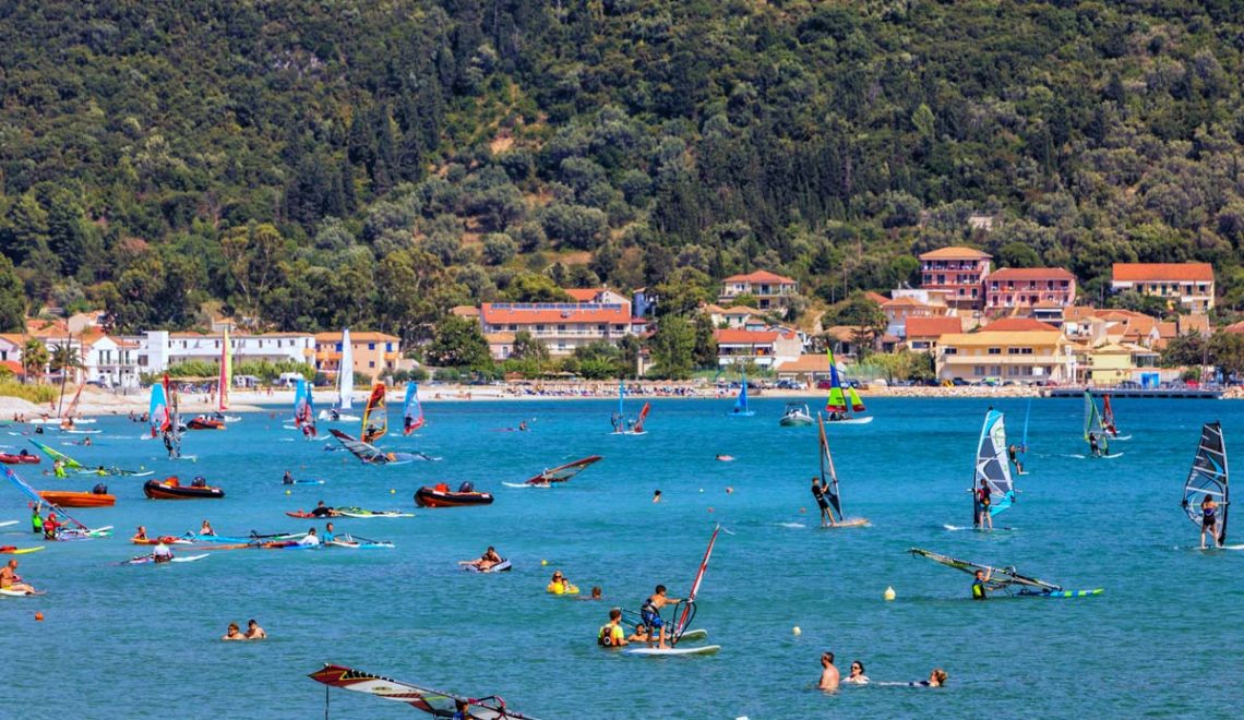 Windsurfers sailing across the Vasiliki Beach in Lefkada Greece