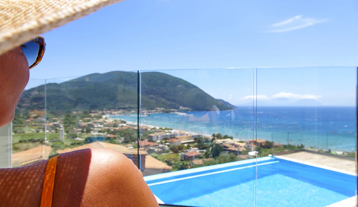 Villa Irene in vasiliki lefkada, a girl admiring the view over the private pool