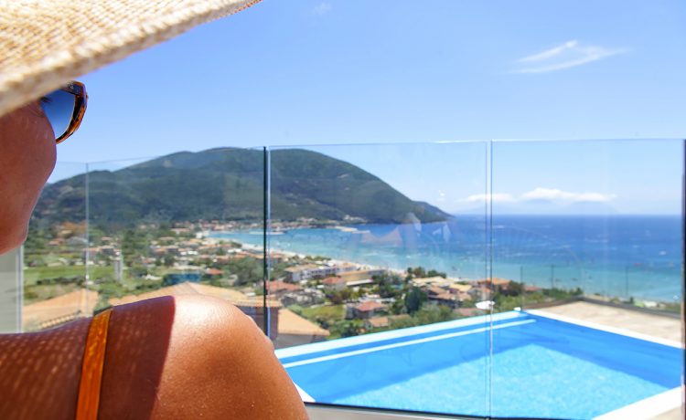 Villa Irene in vasiliki lefkada, a girl admiring the view over the private pool